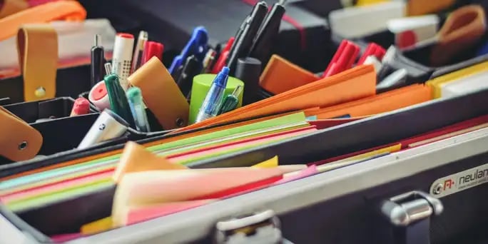 Blog_Business_a bin filled with colorful office supplies