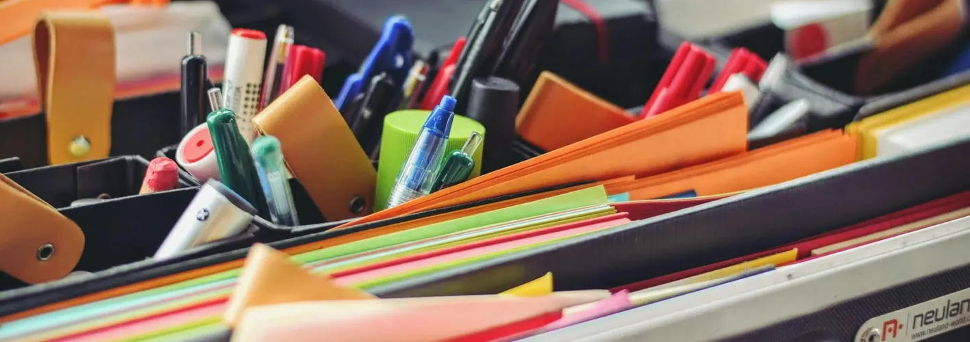 Blog_Business_a bin filled with colorful office supplies