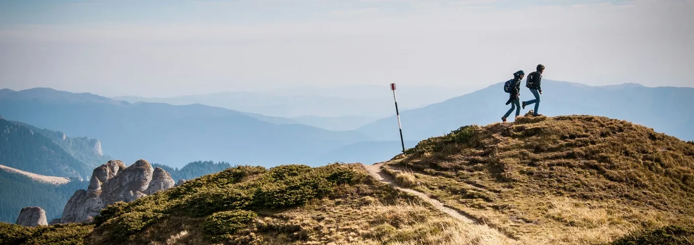 Blog_Inspirational_ Two People Hiking on A Hill  (Web Optimized)