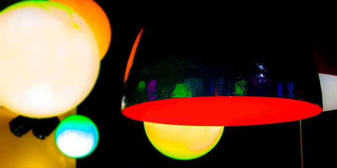 Blog_Abstract_colorful lights hanging with black background (Original)