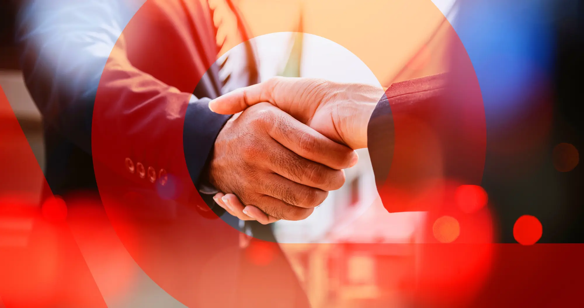 SitecorePartnerRedCircleHandshake.jpg (Web Optimized)