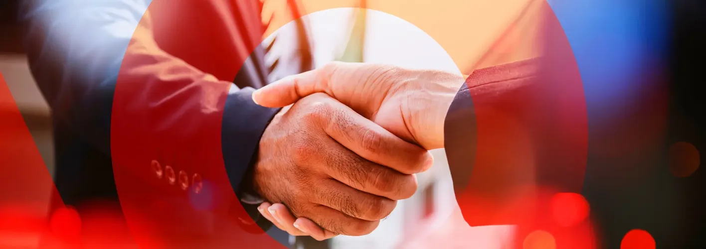 SitecorePartnerRedCircleHandshake.jpg (Web Optimized)
