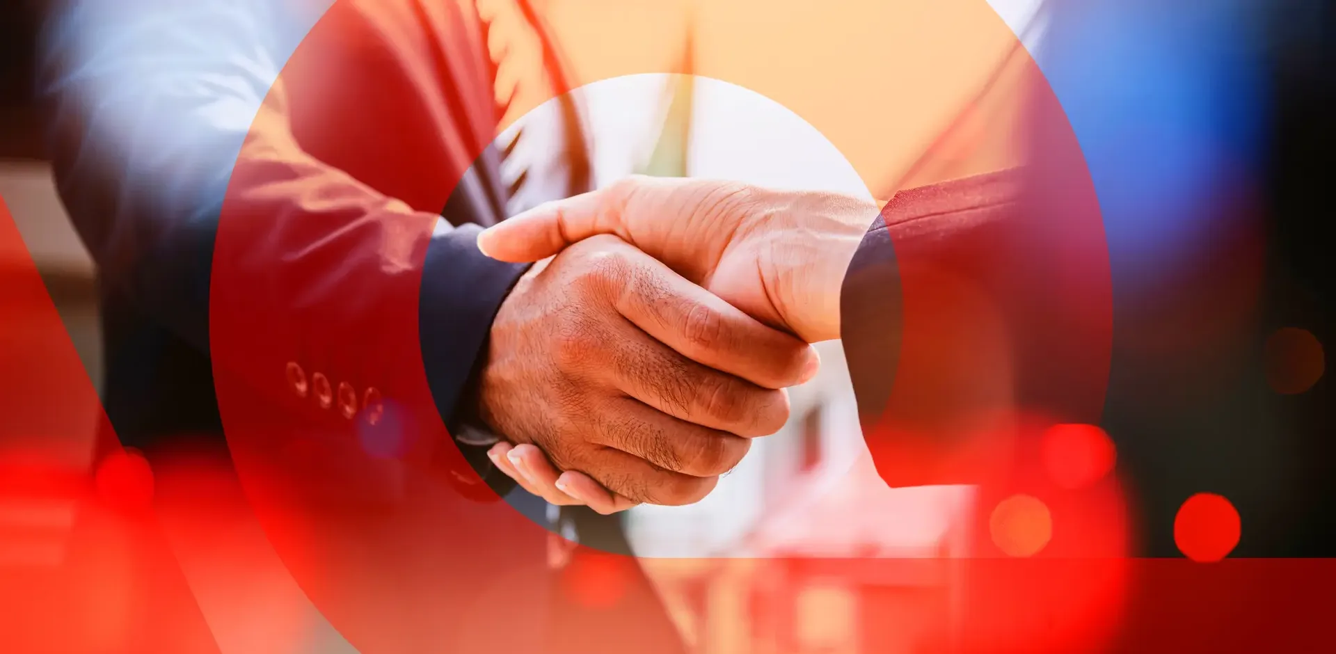SitecorePartnerRedCircleHandshake.jpg (Web Optimized)